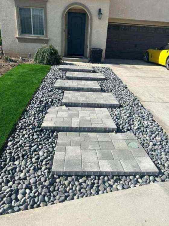 Paver path through river rock
